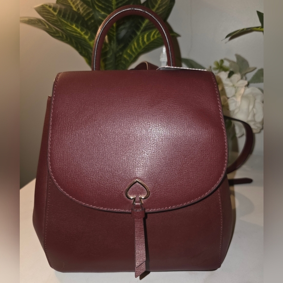 kate spade Handbags - Kate Spade Burgundy Backpack ( New With Tag )